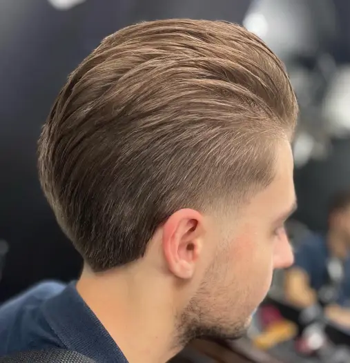 18. Styled Pompadour and Classic Taper haircut