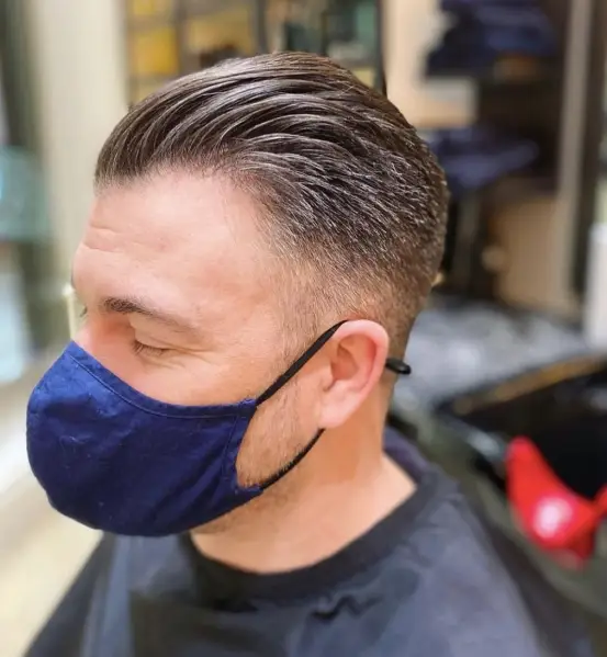 Taper Fade Slicked Back haircut